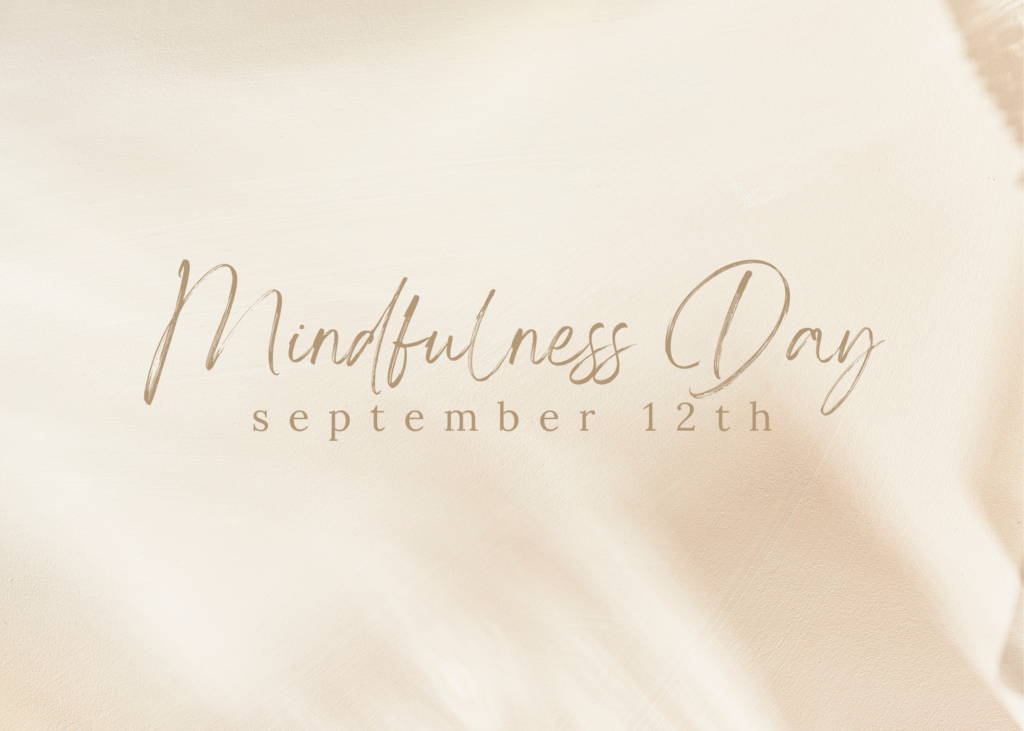 a glowy gold background with the words "mindfulness day september 12 crystals for mindfulness"